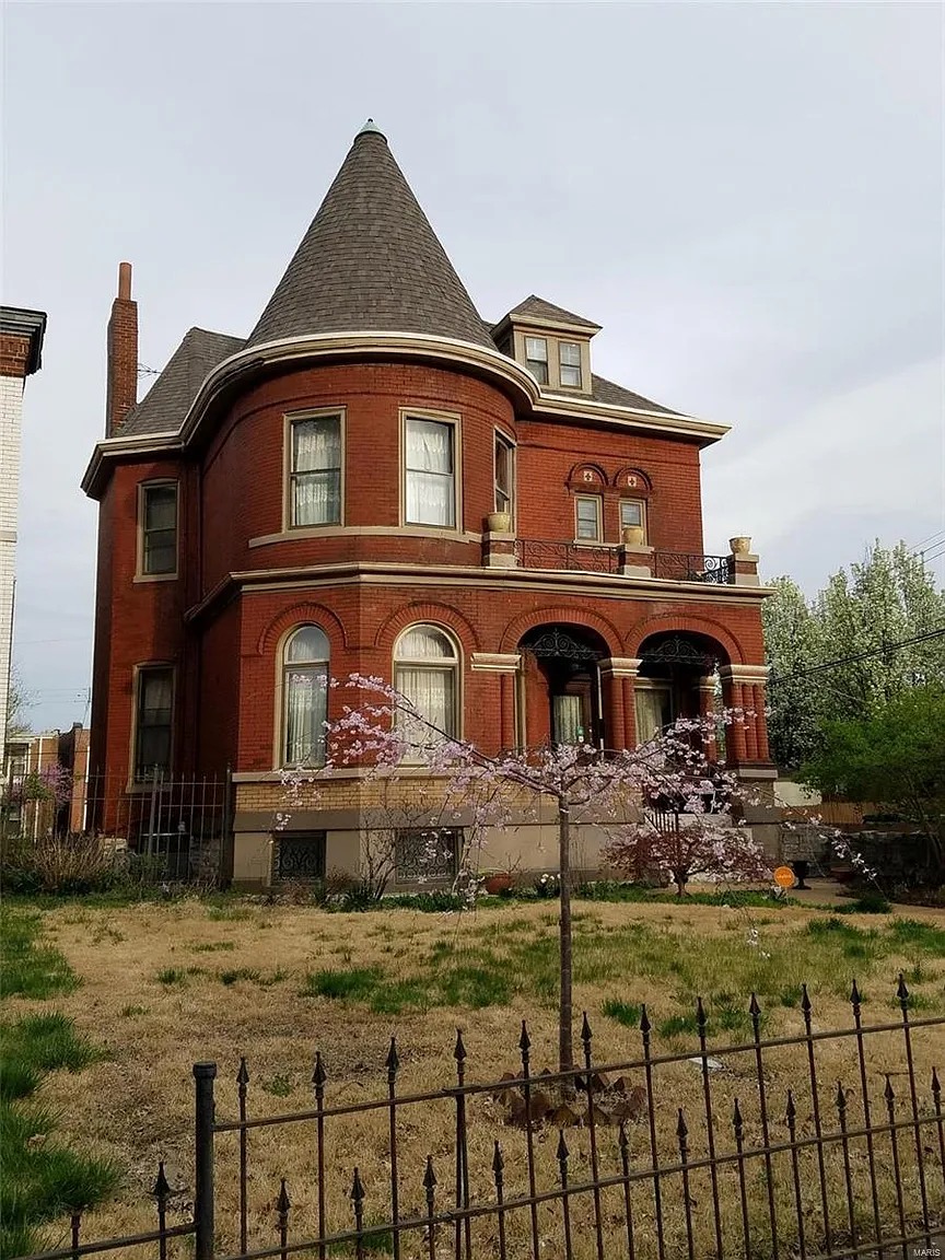  1898: A Stately Red Brick Victorian Mansion